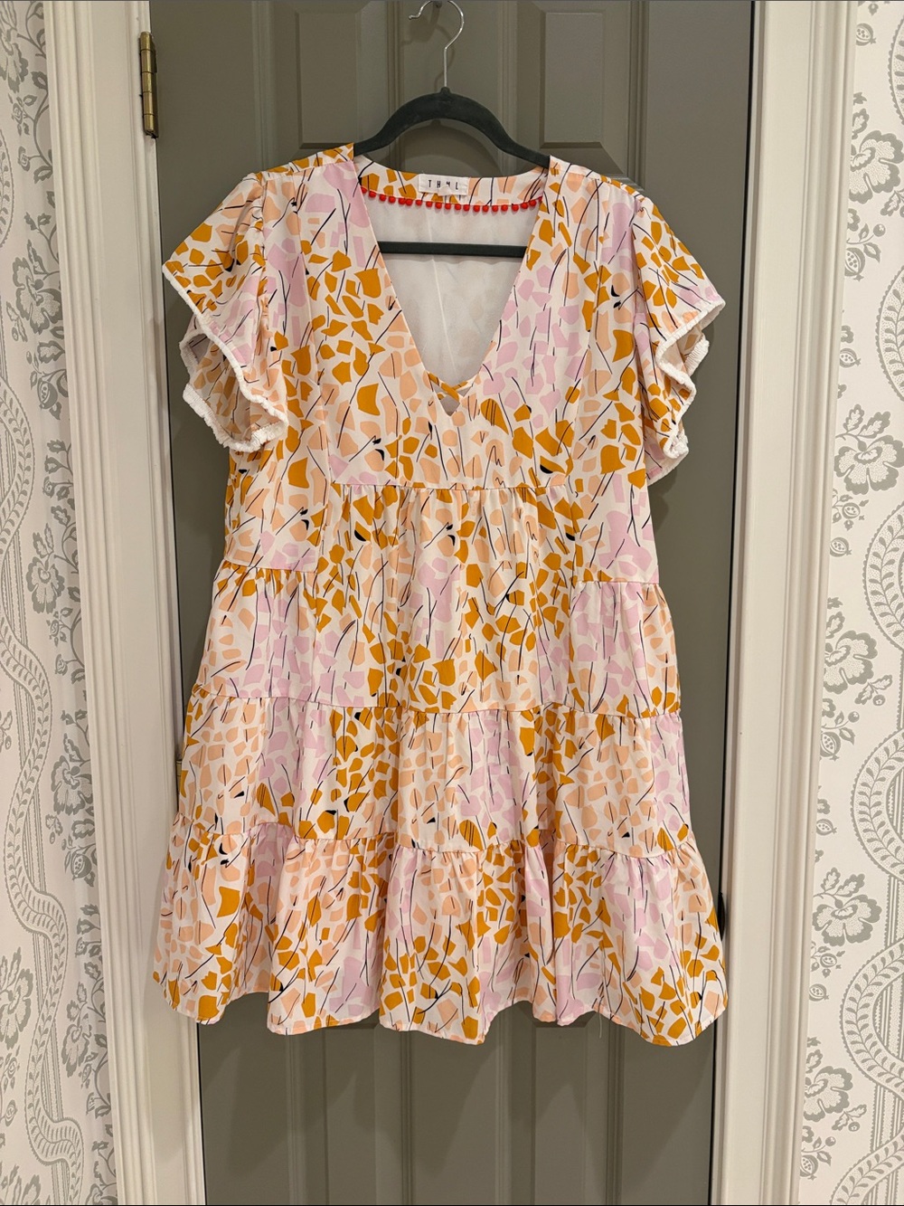 THML White Blouse with Orange Floral and Red Pom Trim